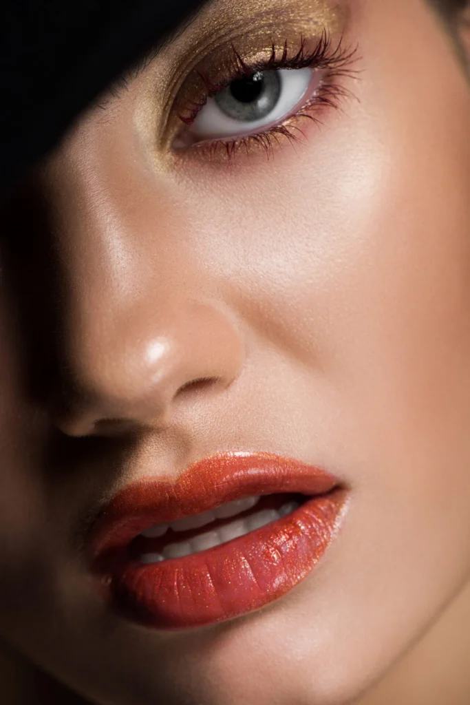 close up of attractive girl with makeup on face showing Lip Filler